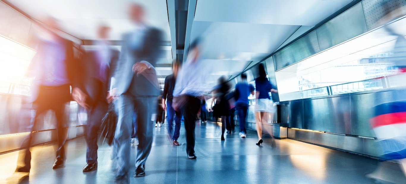 Business People Walking In Crowd